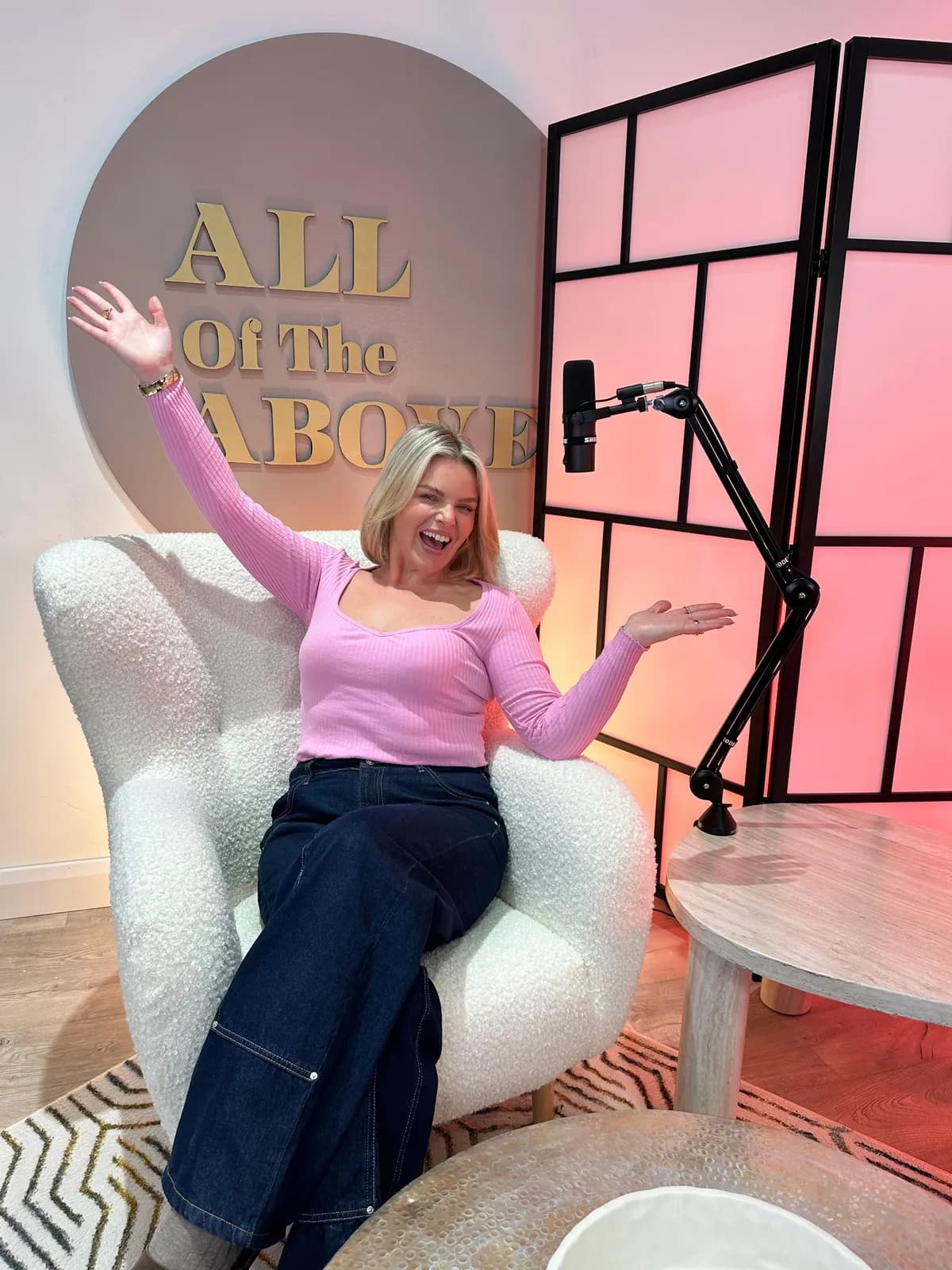 Emma Kehoe laughing on the pink All Of The Above set at Magic Door Studio