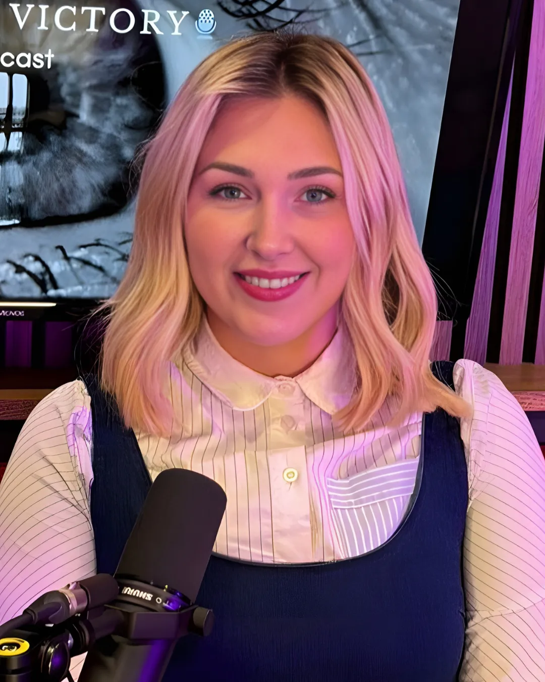 Lauren Reilly at the mic on the Victim to Victory set